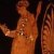 Artemis, wearing jewels and fully armed with spears and arrows, watches as Iphigenia prepares to be sacrificed. From a Greek vase dated circa 400 BCE.